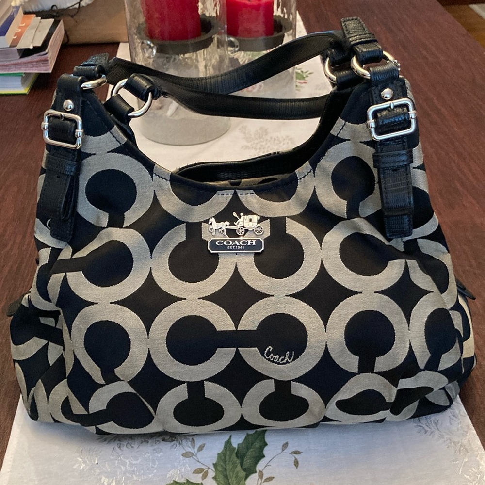 COACH HANDBAG with drawstring bag protector, three compartmentments.
